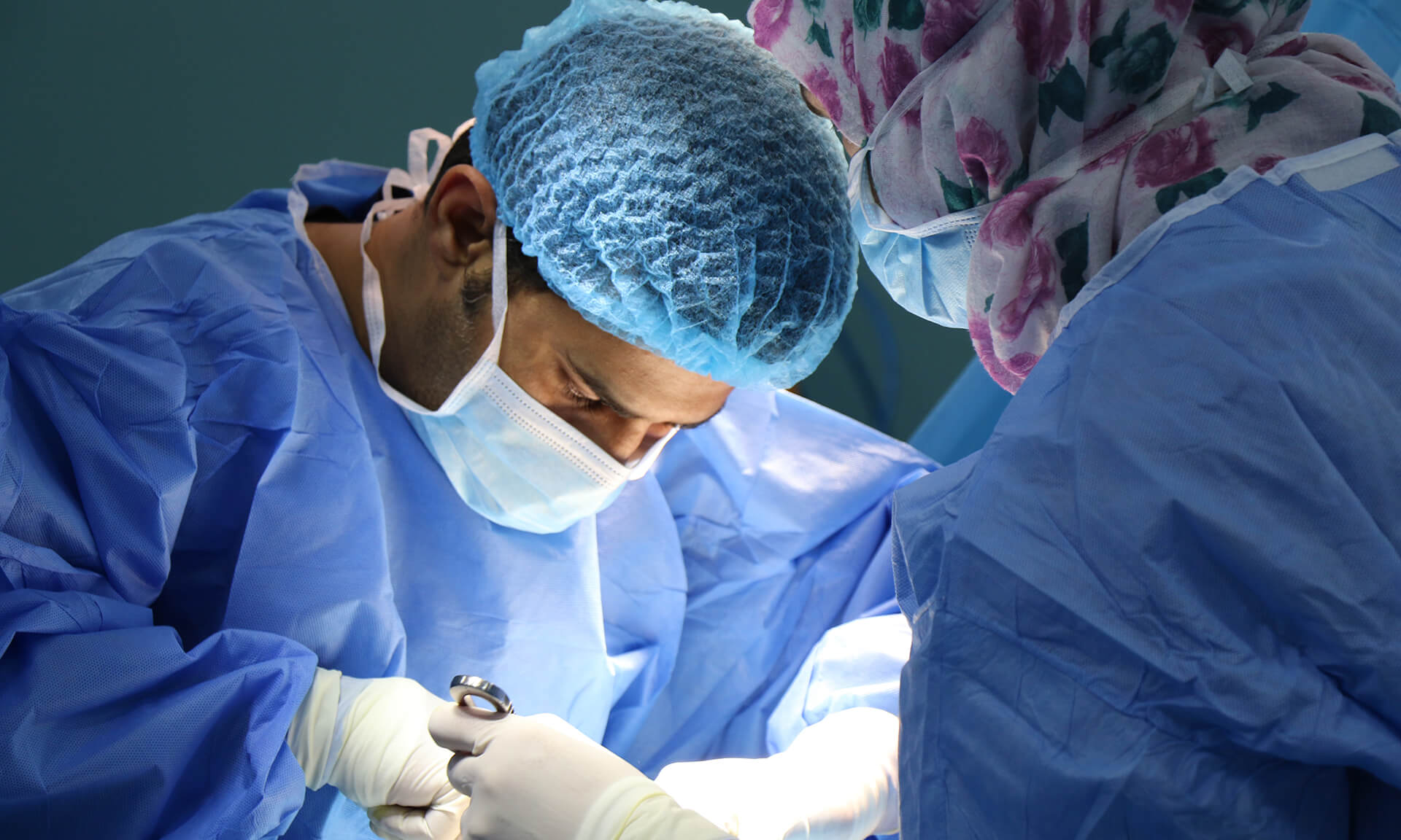 Surgical team at work in an operating theatre